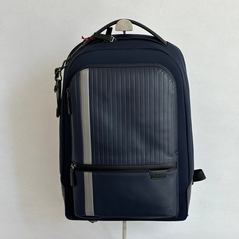 tumi harrison navy backpack with luggage tag